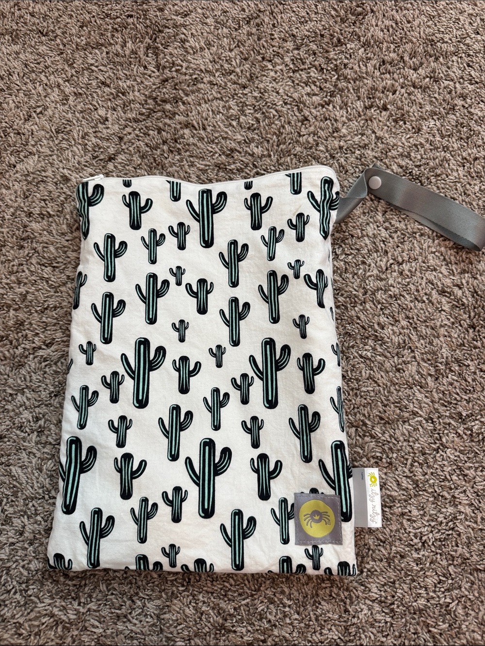 Itzy Ritzy Cactus Print Wet/Dry Bag with Wrist Strap - White & Green